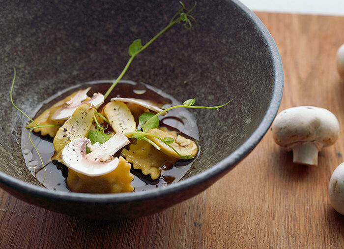 Mushroom & Chestnut Agnolotti with Burnt Onion Consommé