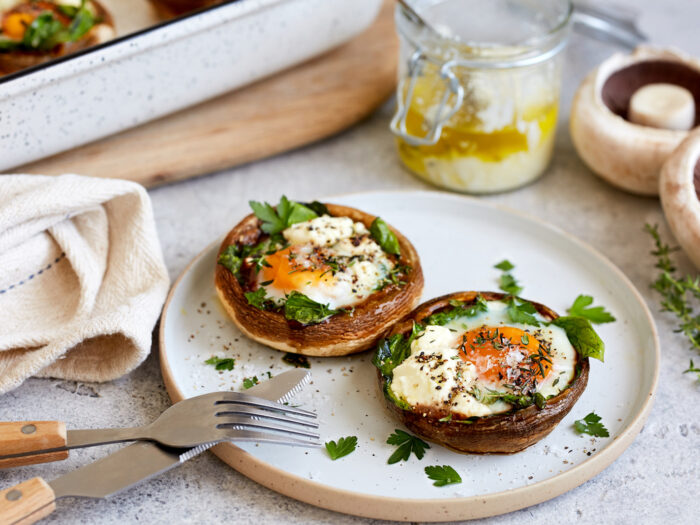 Baked breakfast mushrooms stuffed with spinach, feta and egg