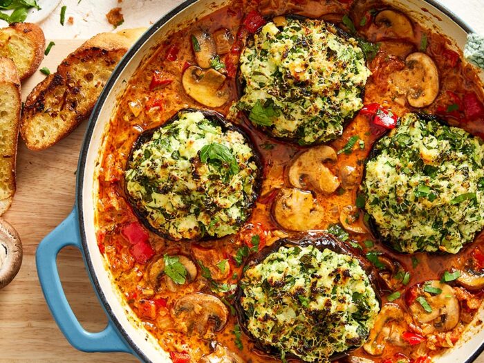 Stuffed portobello mushrooms, simmered in a creamy sauce