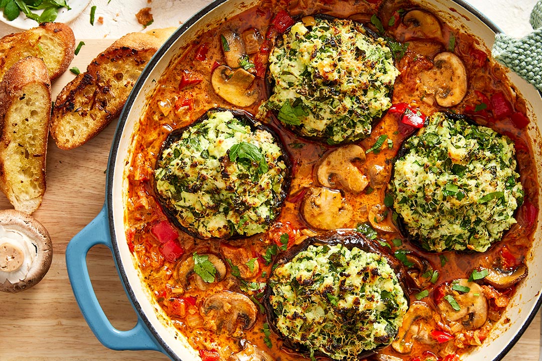 Stuffed portobello mushrooms, simmered in a creamy sauce